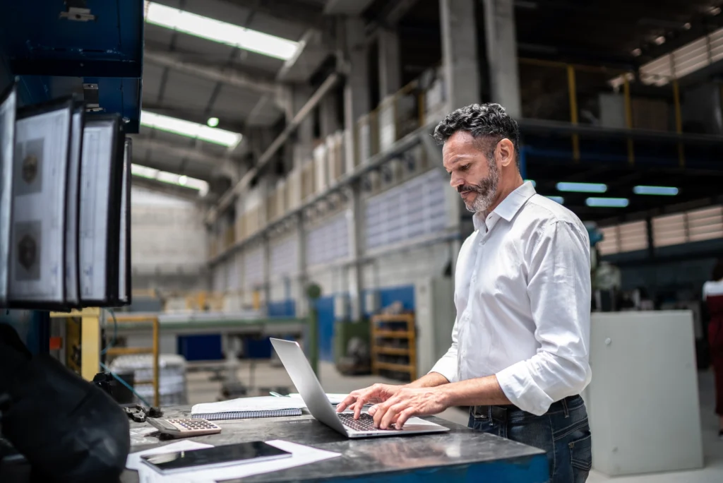 Plant employee doing asset tracking via Junot Barcoding